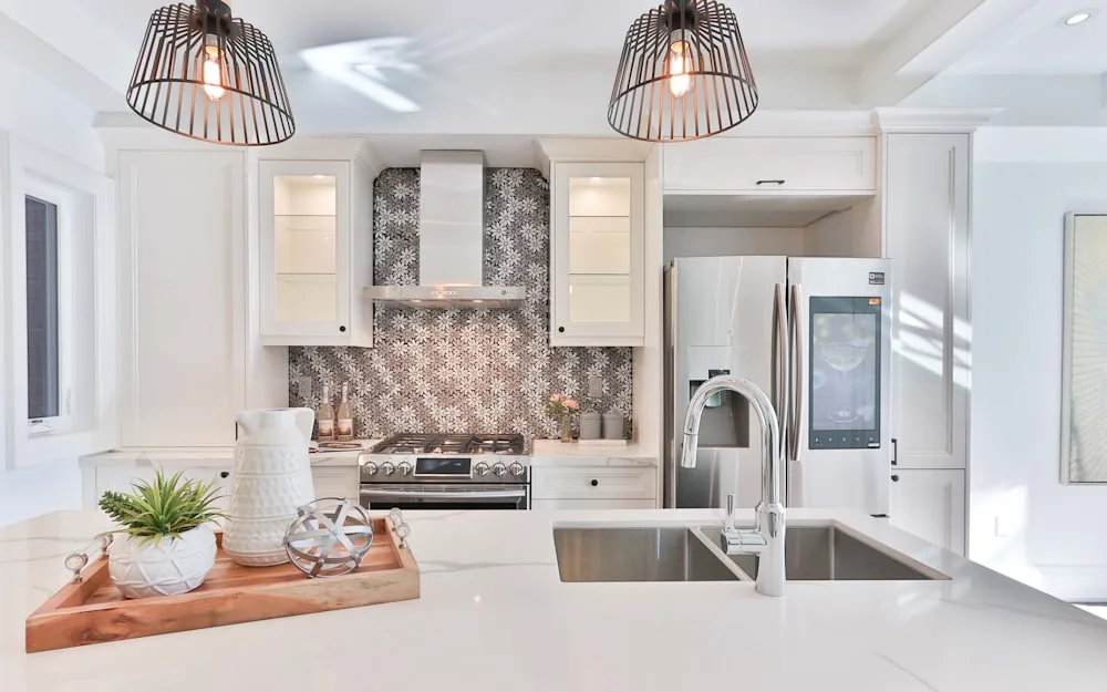 A bright, empty kitchen prepared for a new tenancy.